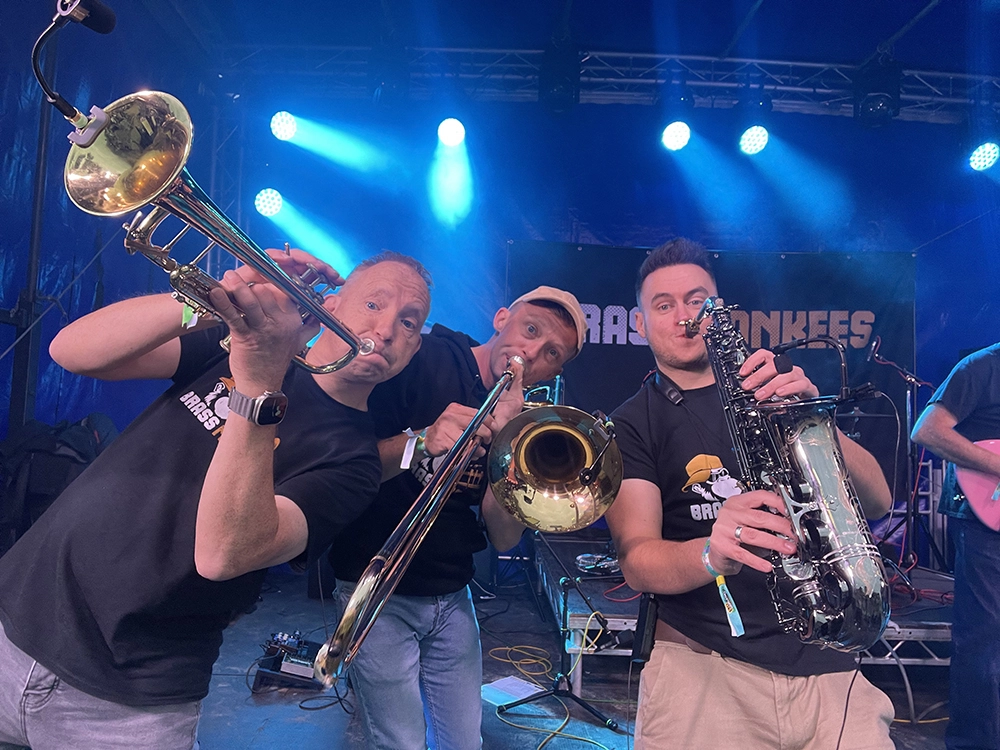 Brass section from corporate function band performing at Liverpool event