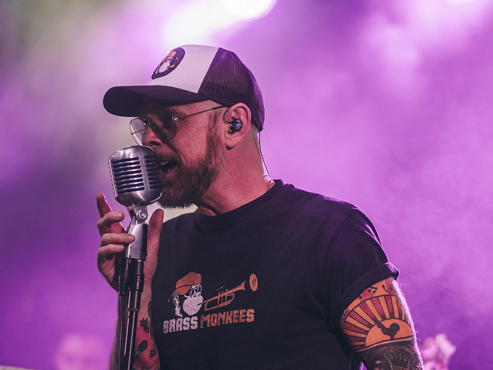 Lead singer of corporate function band performing at live event in Staffordshire