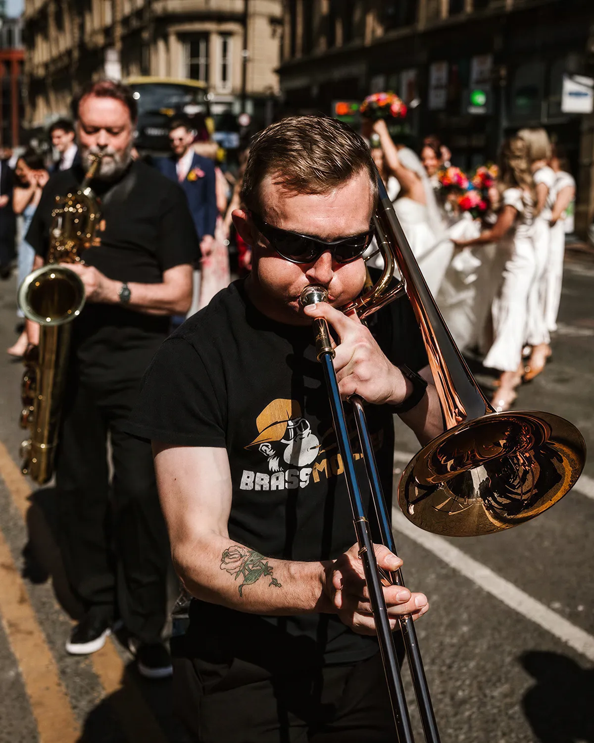 Brass Monkees 4-piece roaming brass band playing in Manchester