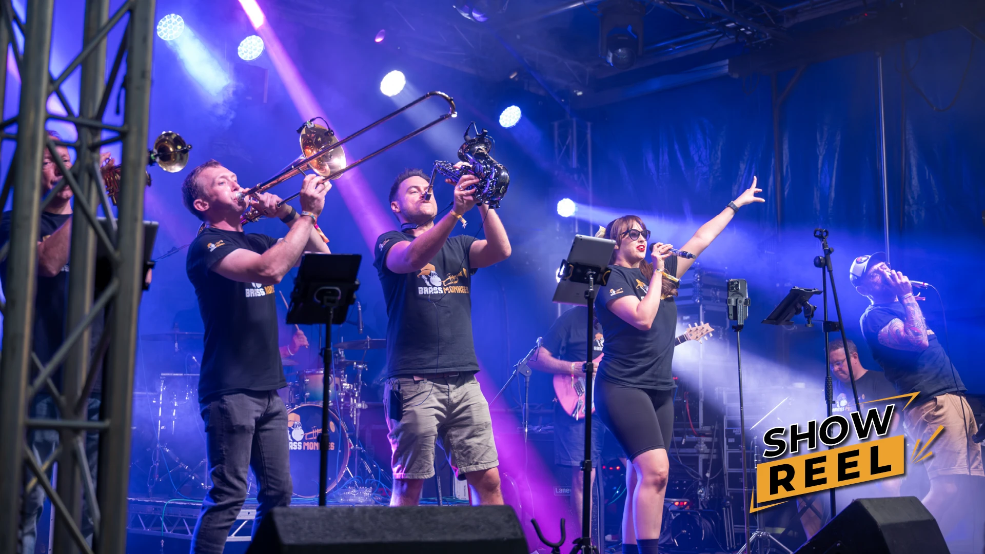 Brass Monkees 9-piece band on stage, play the showreel