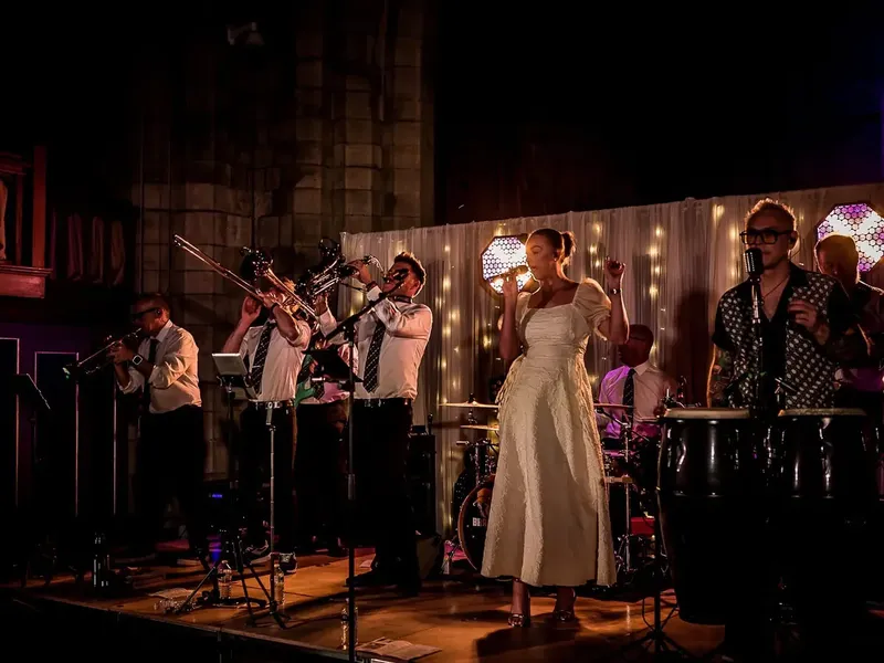 Brass Monkees 9-piece function band performing live with horns, available for parties across Shropshire