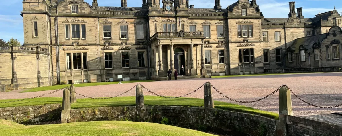 The stone front of Sandon Hall, a Jacobean-style stately home and wedding venue near Stafford